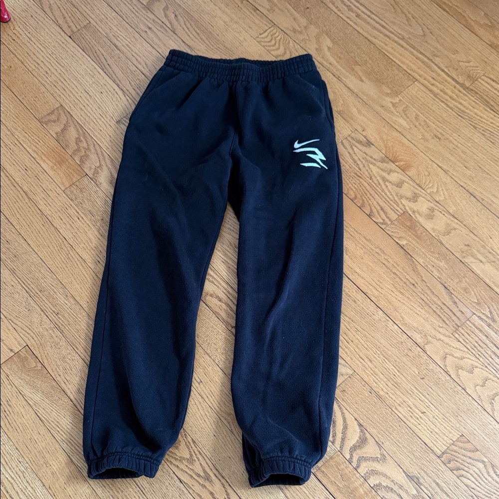 Nike Black Sweatpants with White Swoosh Accent